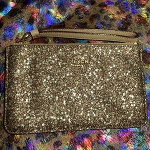 Gold, glittery Coach wristlet